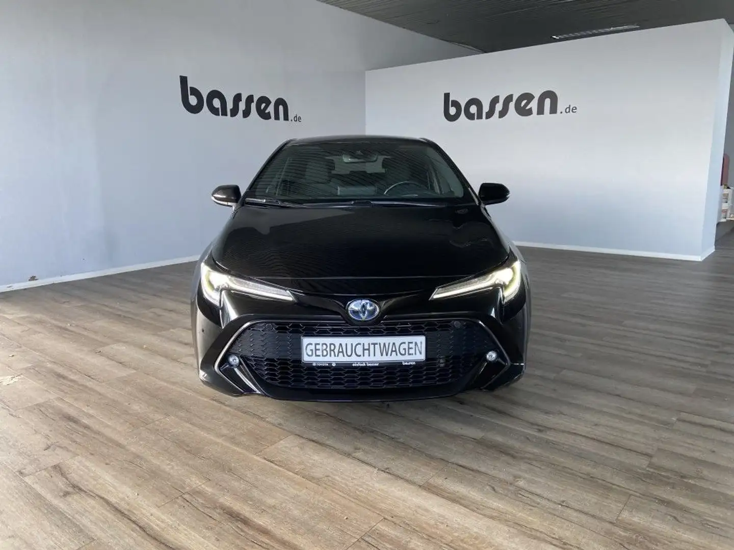 Toyota Corolla 1.8 Hybrid Club Zwart - 1