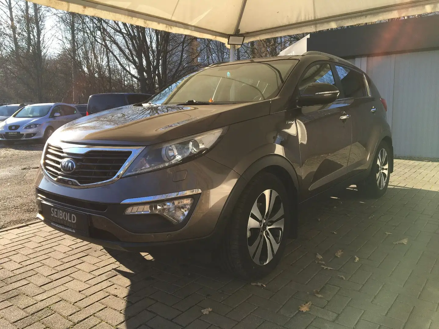 Kia Sportage 2.0 Spirit 4WD/Leder/Navi/Xenon/Pano Braun - 1