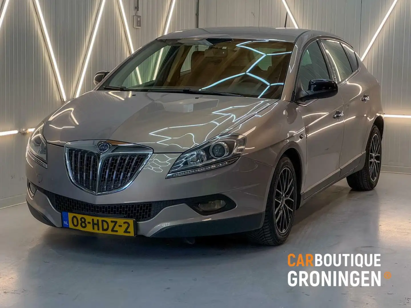 Lancia Delta 1.4-16V Argento 5D | AIRCO | NAP | GOED OH | NWE A Beige - 1