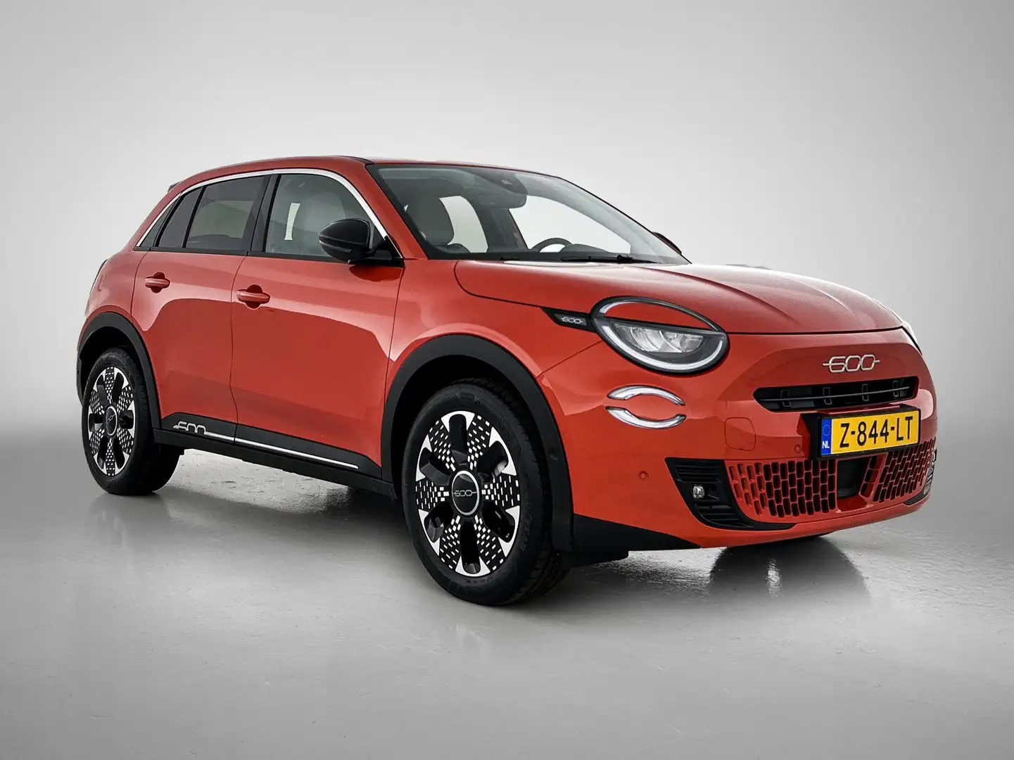 Fiat 600e La Prima 54 kWh 156pk Automaat | 11 KW Lader | Nav Narancs - 2