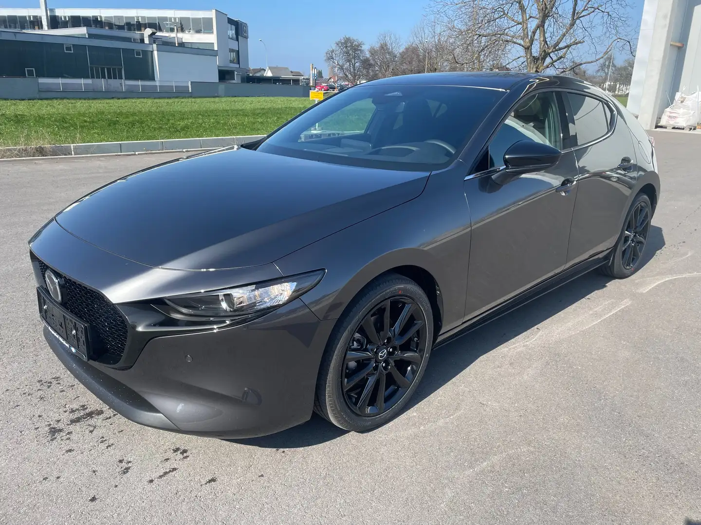 Mazda 3 e-Skyactiv G140 Homura Automatik 2,5L Grau - 1