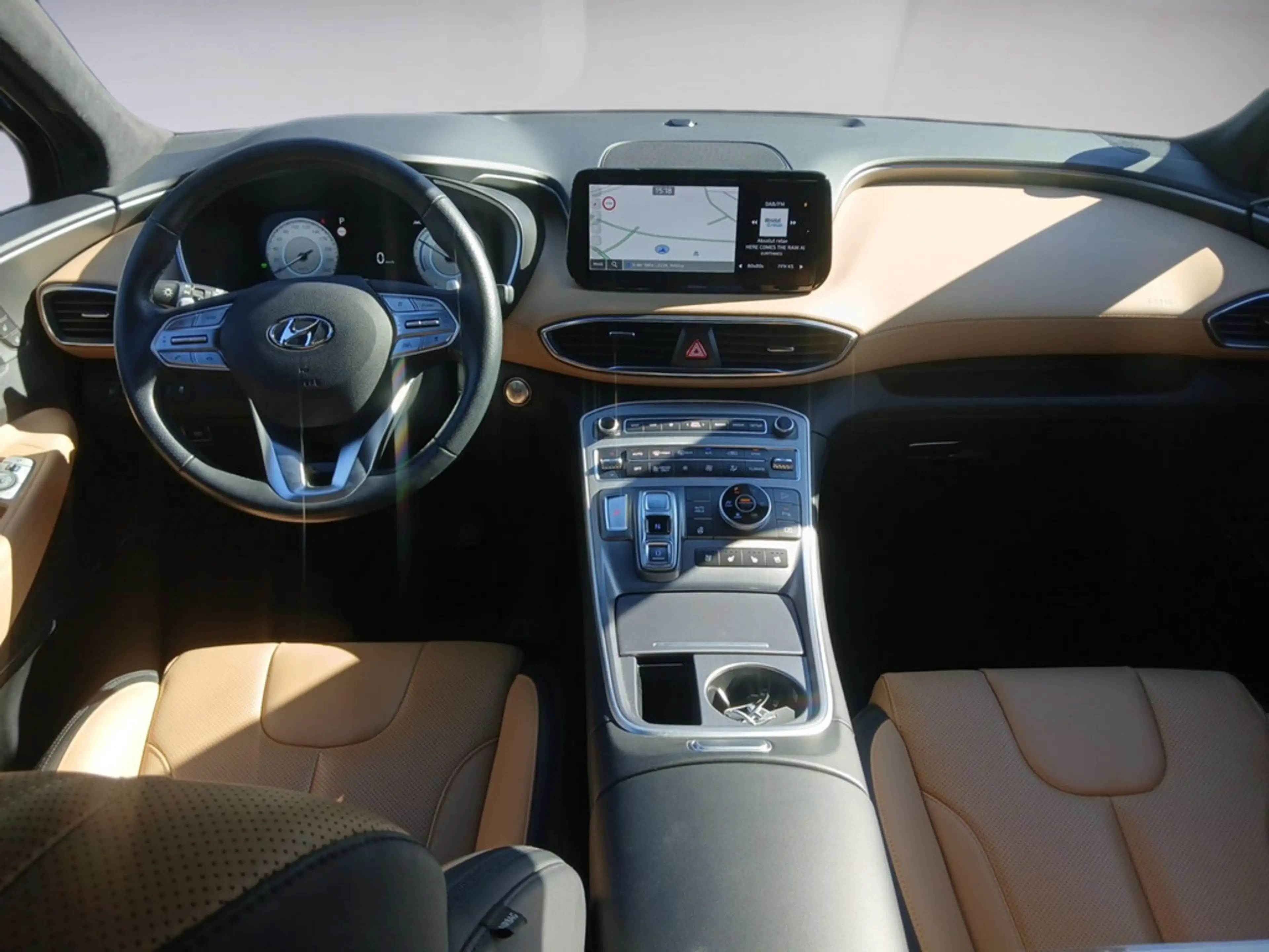Hyundai SANTA FE 1.6 Signature Hybrid 4WD PANO 360° — photo 12