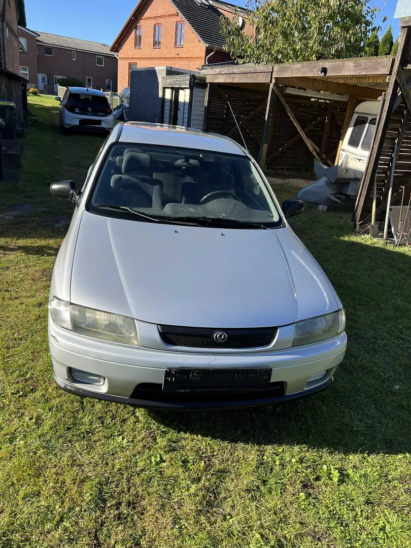 Mazda 323 323 C 1.4 Youngster Silber - 2