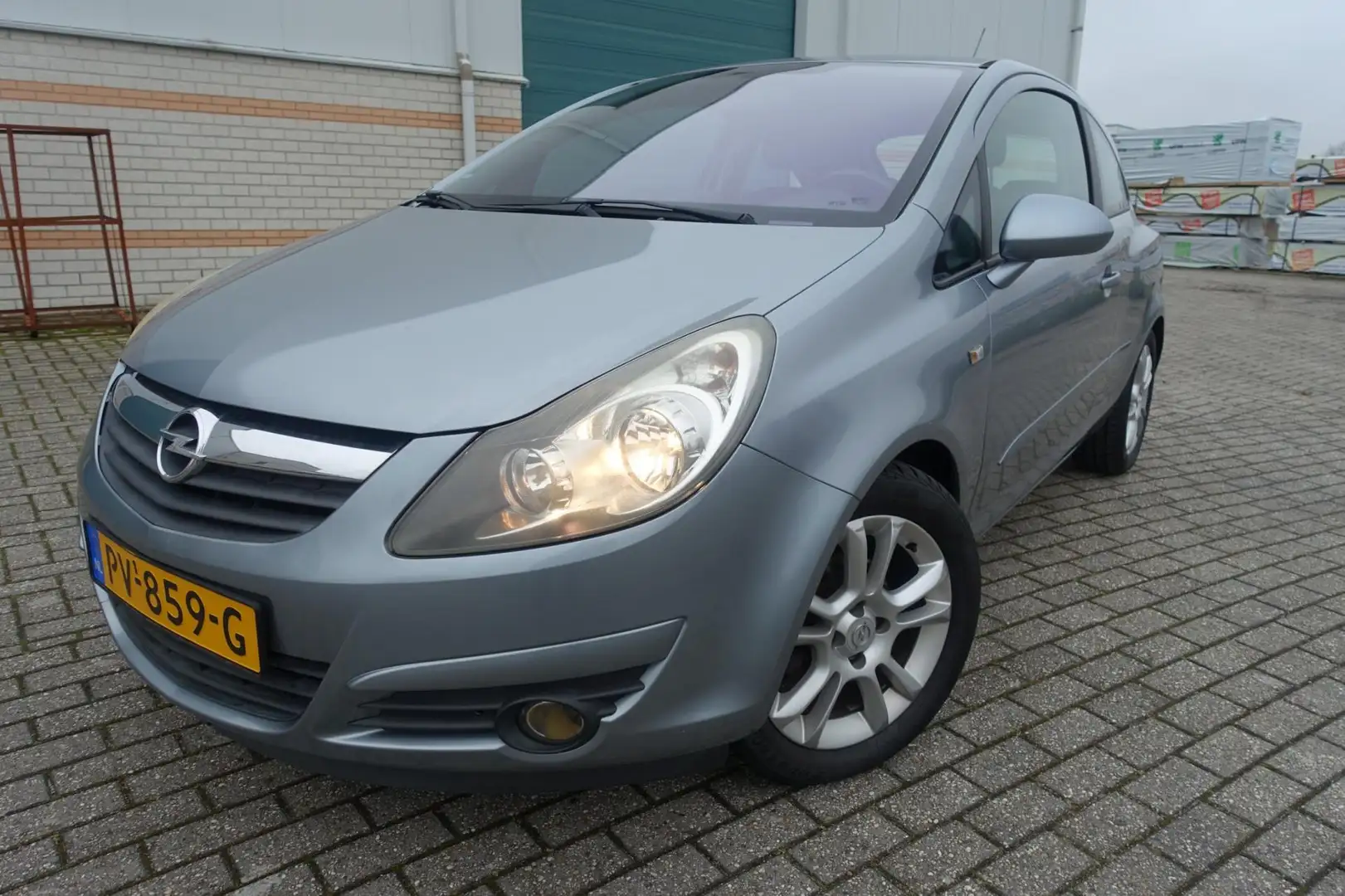 Opel Corsa 1.4-16V Sport - lm velgen & all season banden - el Grau - 1