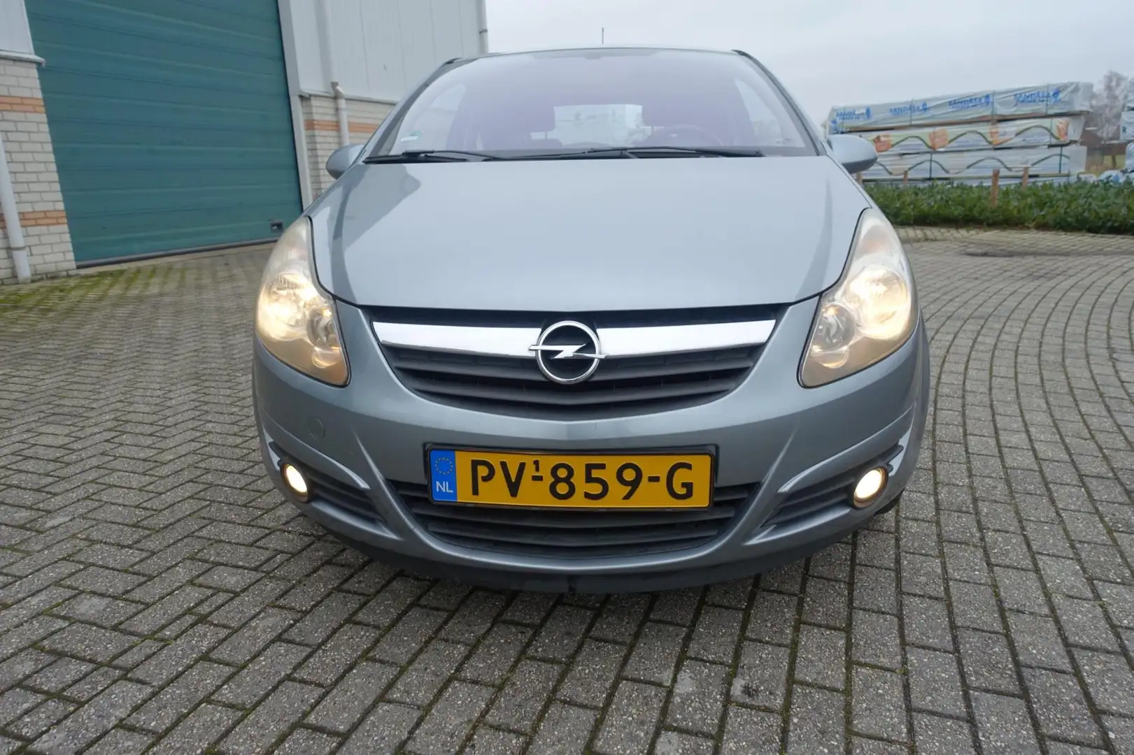Opel Corsa 1.4-16V Sport - lm velgen & all season banden - el Grijs - 2