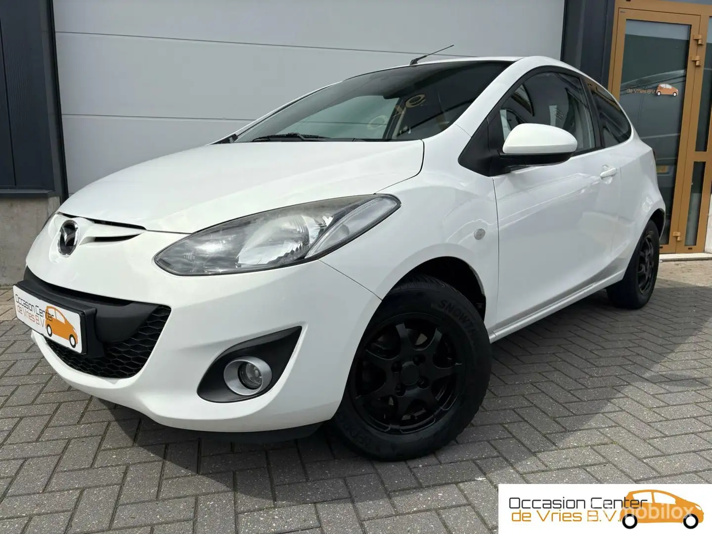 Mazda 2 1.3 GT-L Line Airco Velgen Stoelverwarming Bluetoo Weiß - 1