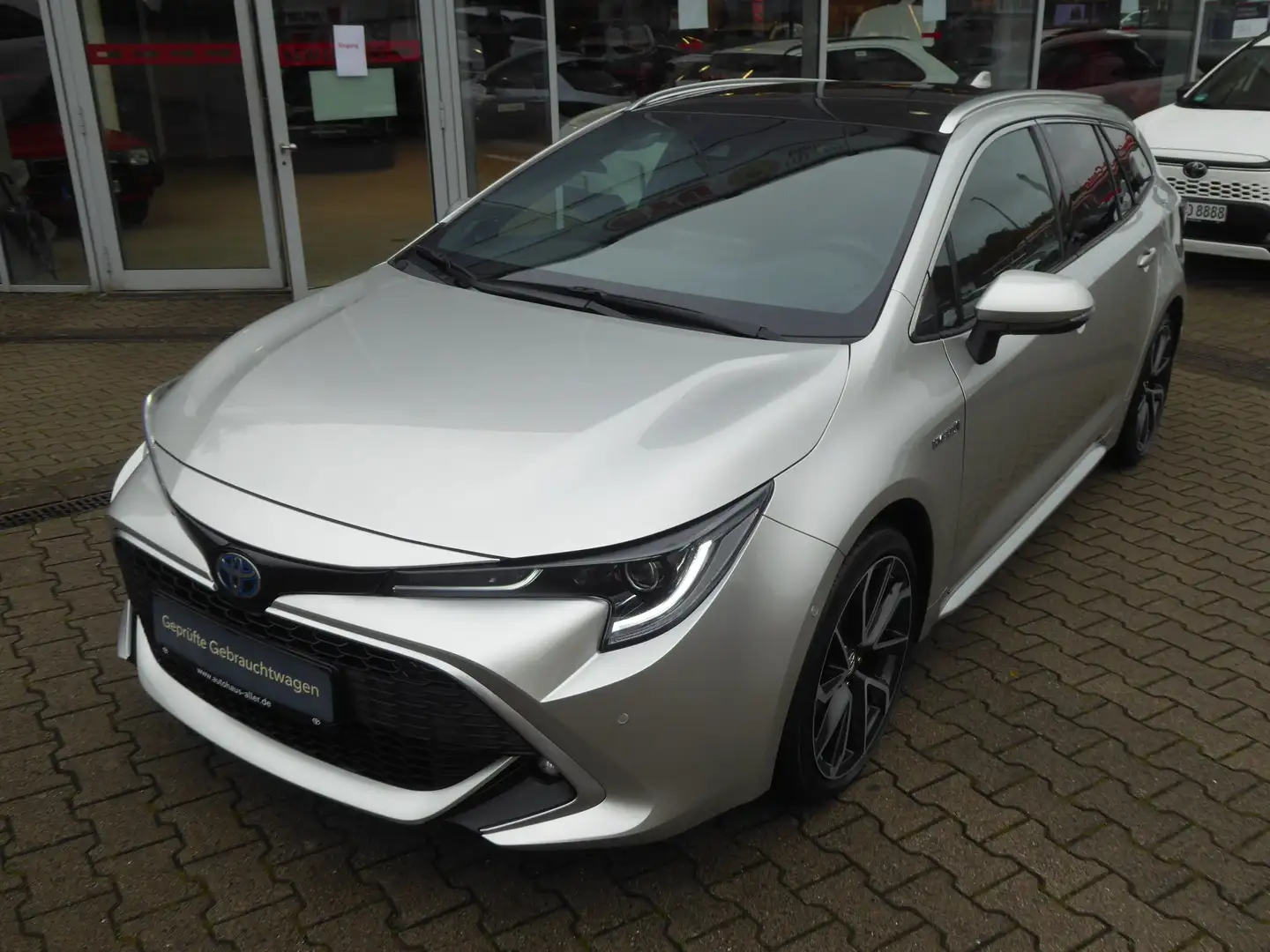Toyota Corolla 2,0 l Hybrid Lounge + JBL + AHK + Schiebedach Grau - 1