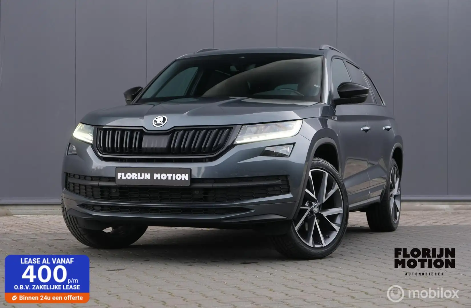Skoda Kodiaq 1.5 TSI Sportline Business 7p.| Trekhaak | Camera Grijs - 1