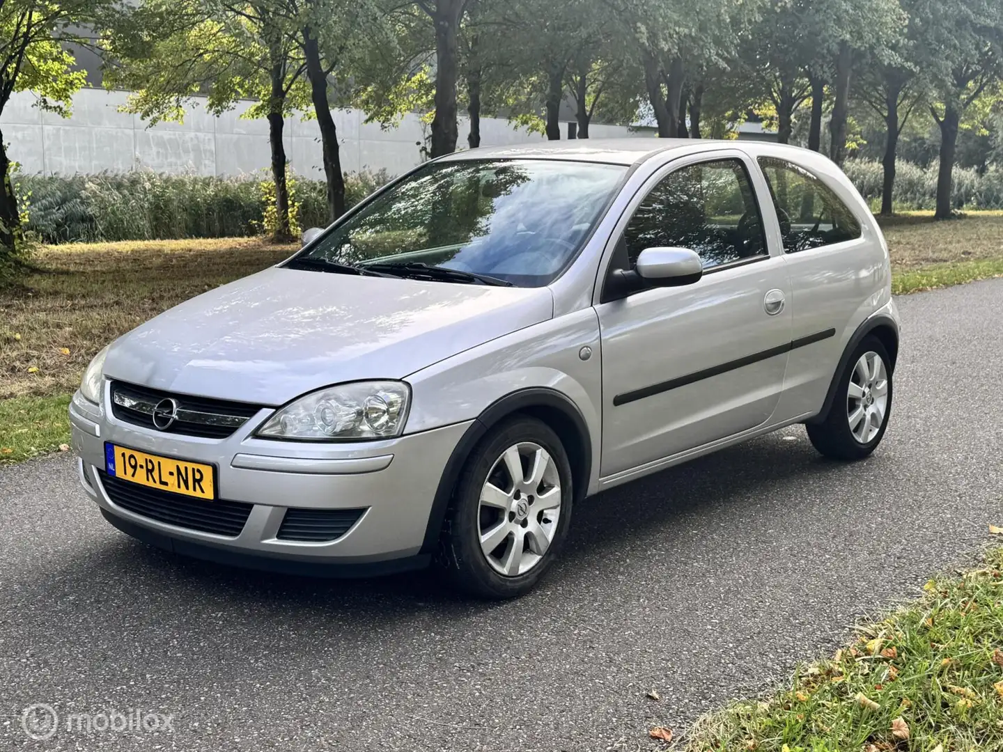 Opel Corsa 1.2-16V Full Rhythm*NAP*NEW APK 11/26*AIRCO Grijs - 1