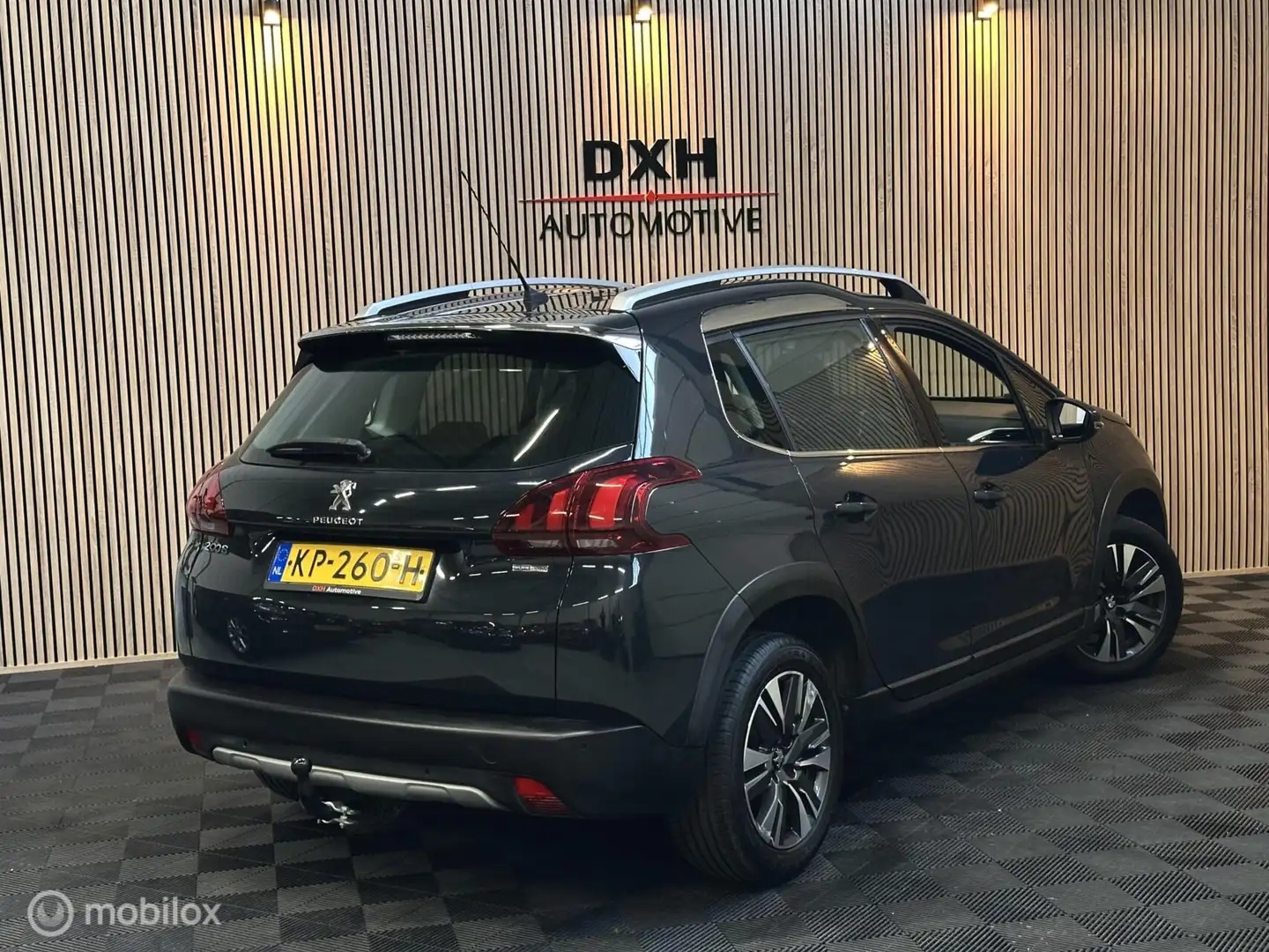 Peugeot 2008 1.2 PureTech Allure 2eEIG FACELIFT CARPLAY LEER Grijs - 2