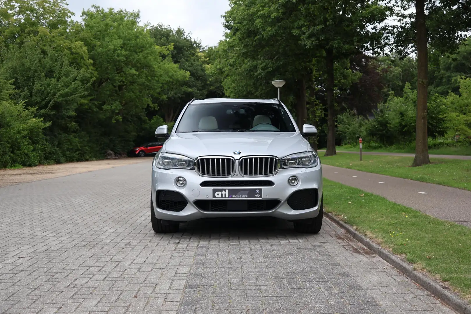 BMW X5 xDrive50i High Executive M Sportpakket, Panoramada Grijs - 2