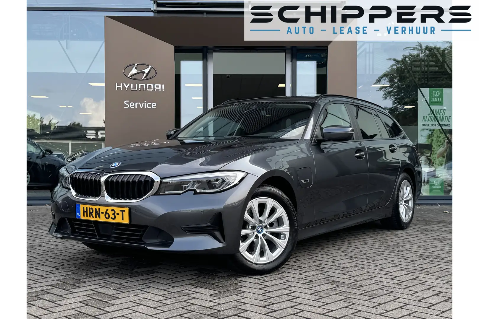 BMW 320 3-serie Touring 320e xDrive | Plug-in Hybrid | AWD Grijs - 1