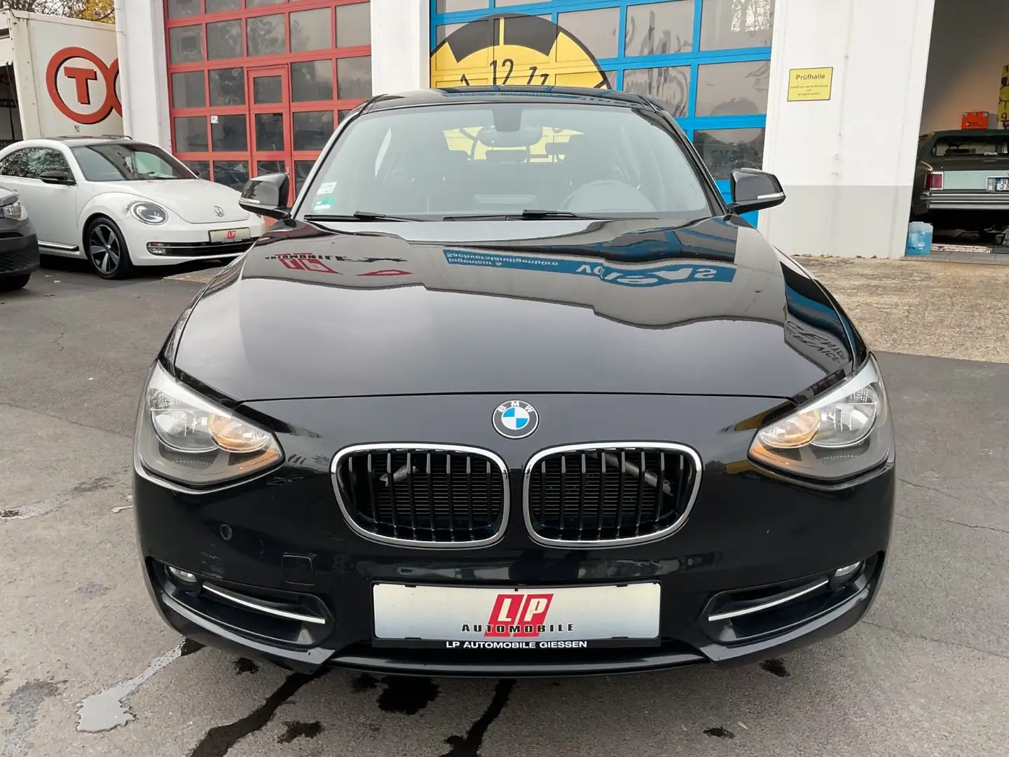 BMW 116 i Limousine 5-trg. Klima SHZ PDC Noir - 2