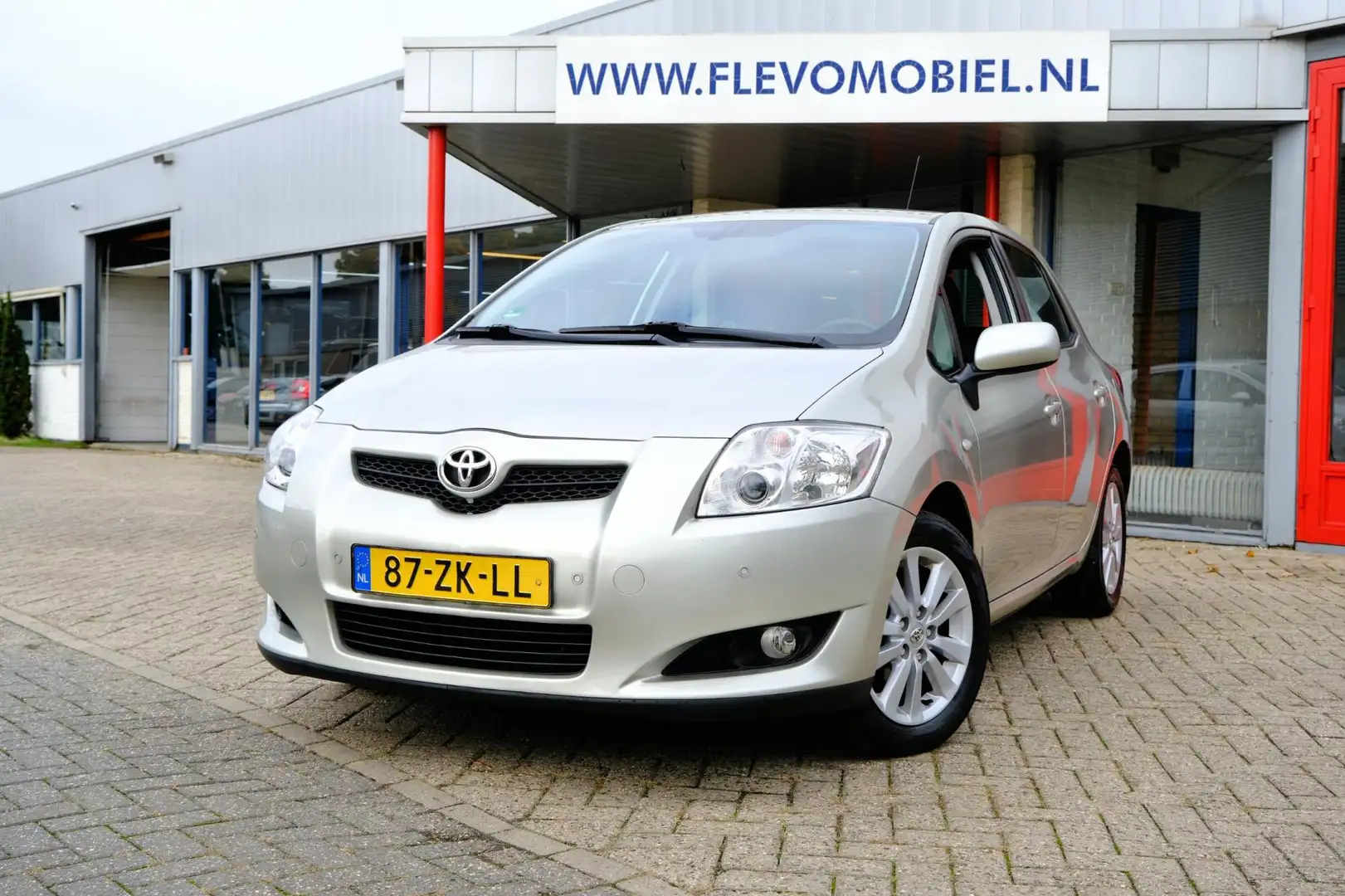 Toyota Auris 1.6-16V Luna Aut. Navi|Clima|PDC|LMV Gris - 1