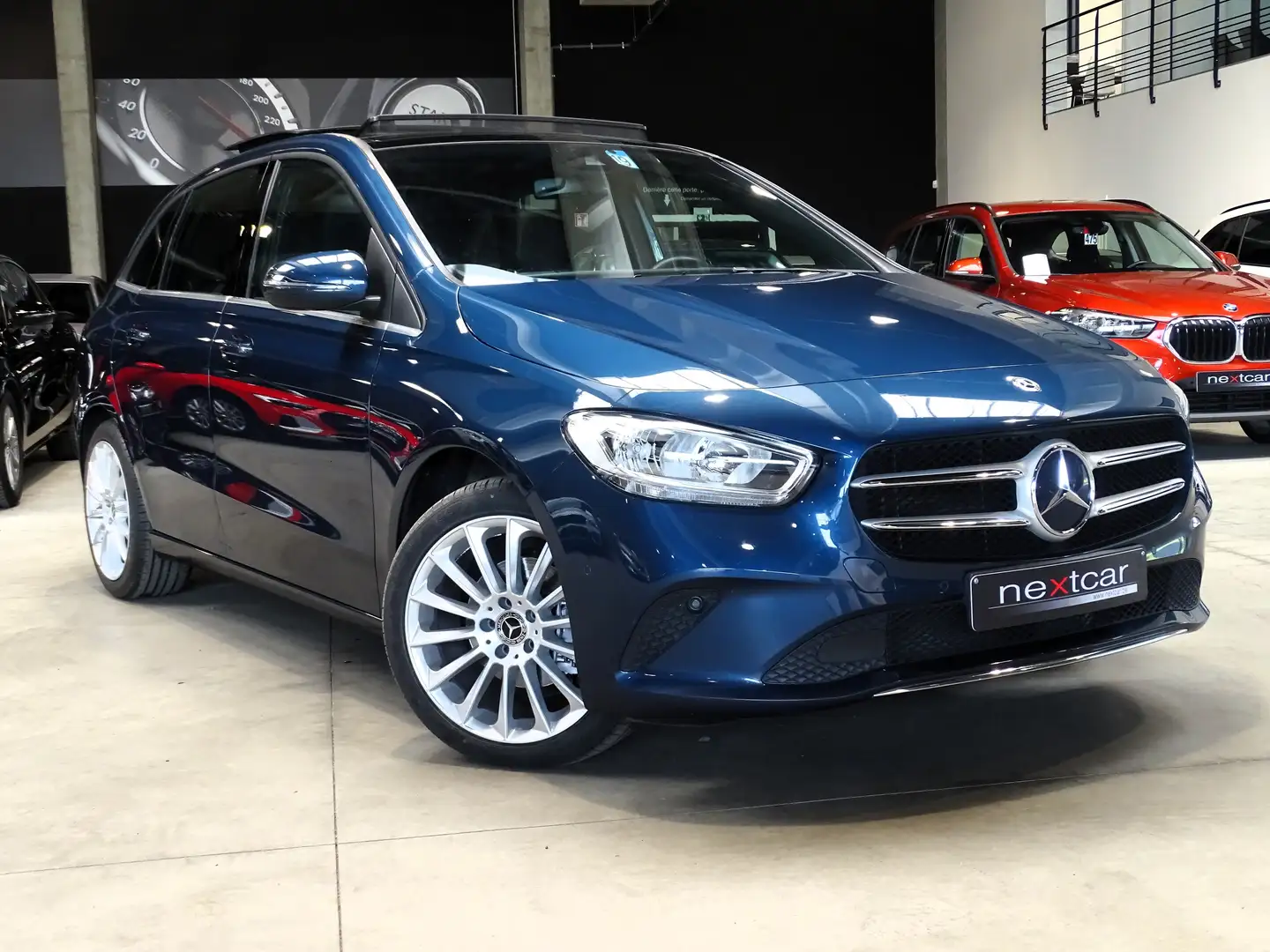 Mercedes-Benz B 180 7G TRONIC *WIDESCREEN-CRUISE-PARKTRONIC-NAVI* Blauw - 2