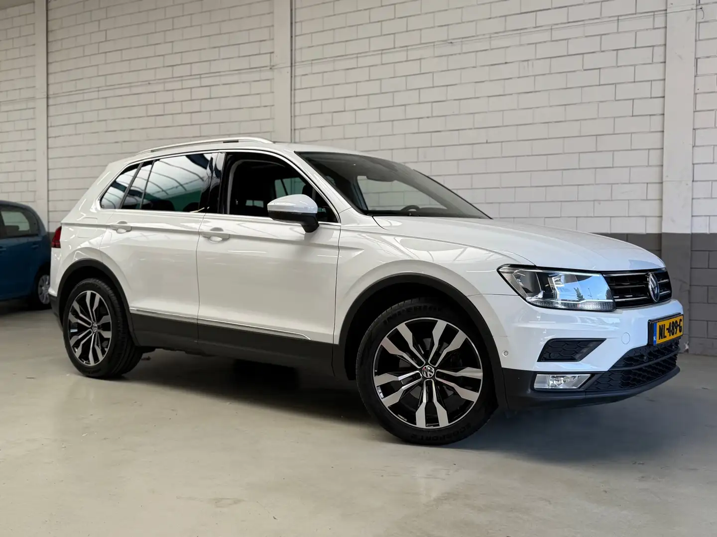 Volkswagen Tiguan 1.4 TSI ACT Connected Series Automaat Wit - 1