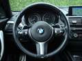 BMW 135 1-serie M135i xDrive High Executive Schwarz - thumbnail 9