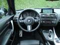 BMW 135 1-serie M135i xDrive High Executive Schwarz - thumbnail 5