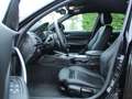 BMW 135 1-serie M135i xDrive High Executive Schwarz - thumbnail 6