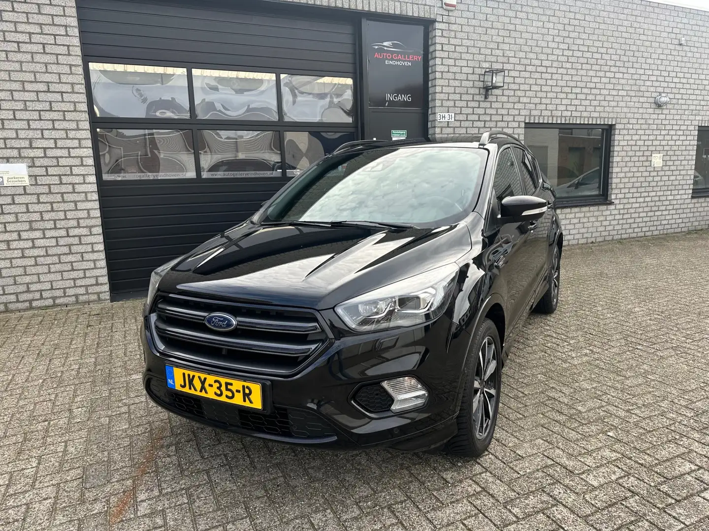 Ford Kuga 1.5 EcoBoost ST Line *NAVI*CAMERA*LM-VELGEN*CRUISE Zwart - 2