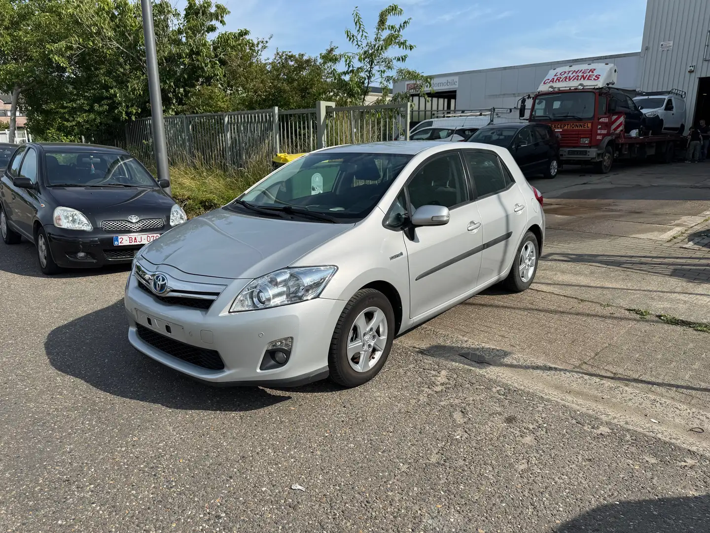 Toyota Auris HEV 1.8i HSD Premium CVT Grijs - 1