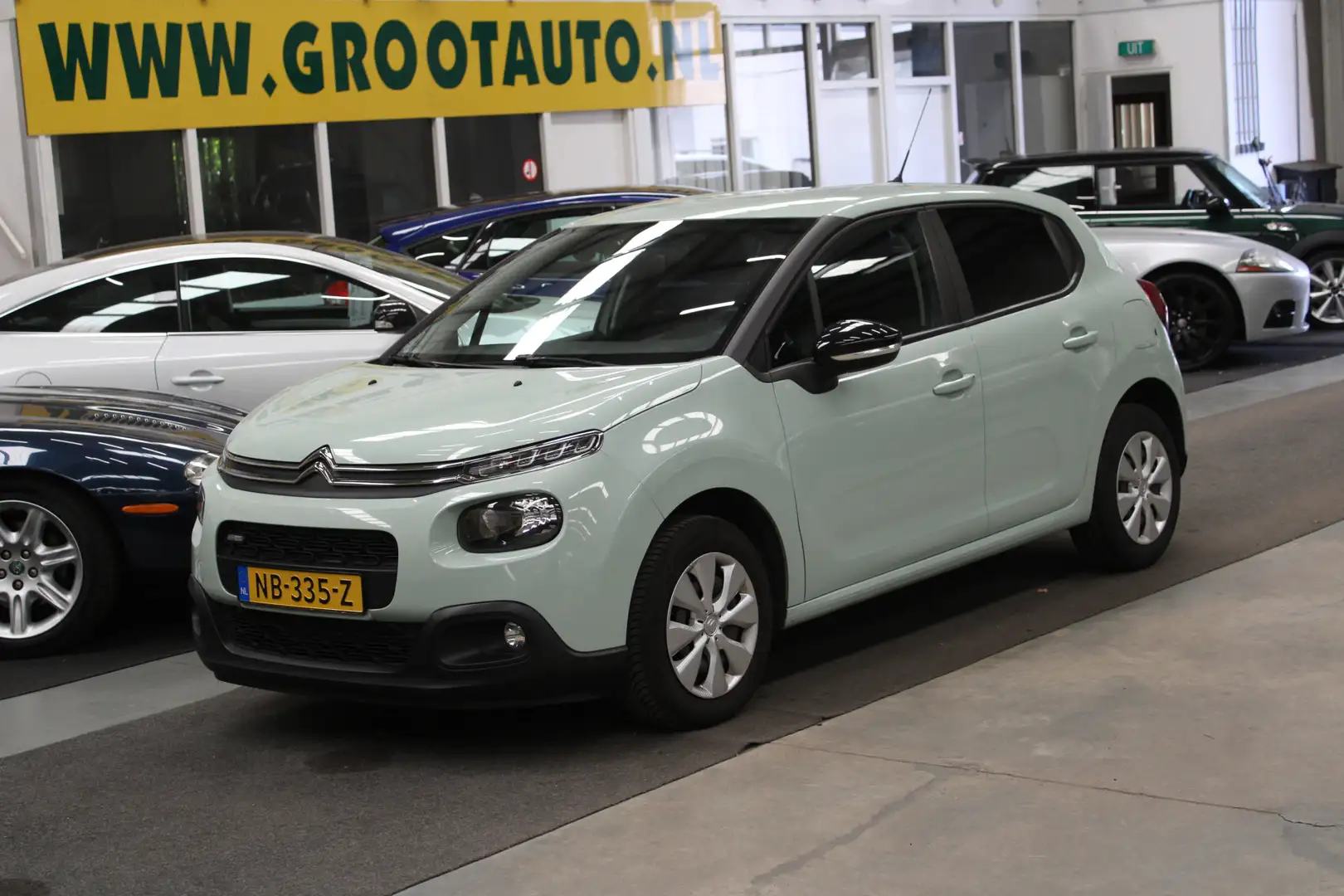 Citroen C3 1.2 PureTech Feel Airco, Cruise Control, Apple Car Grün - 1
