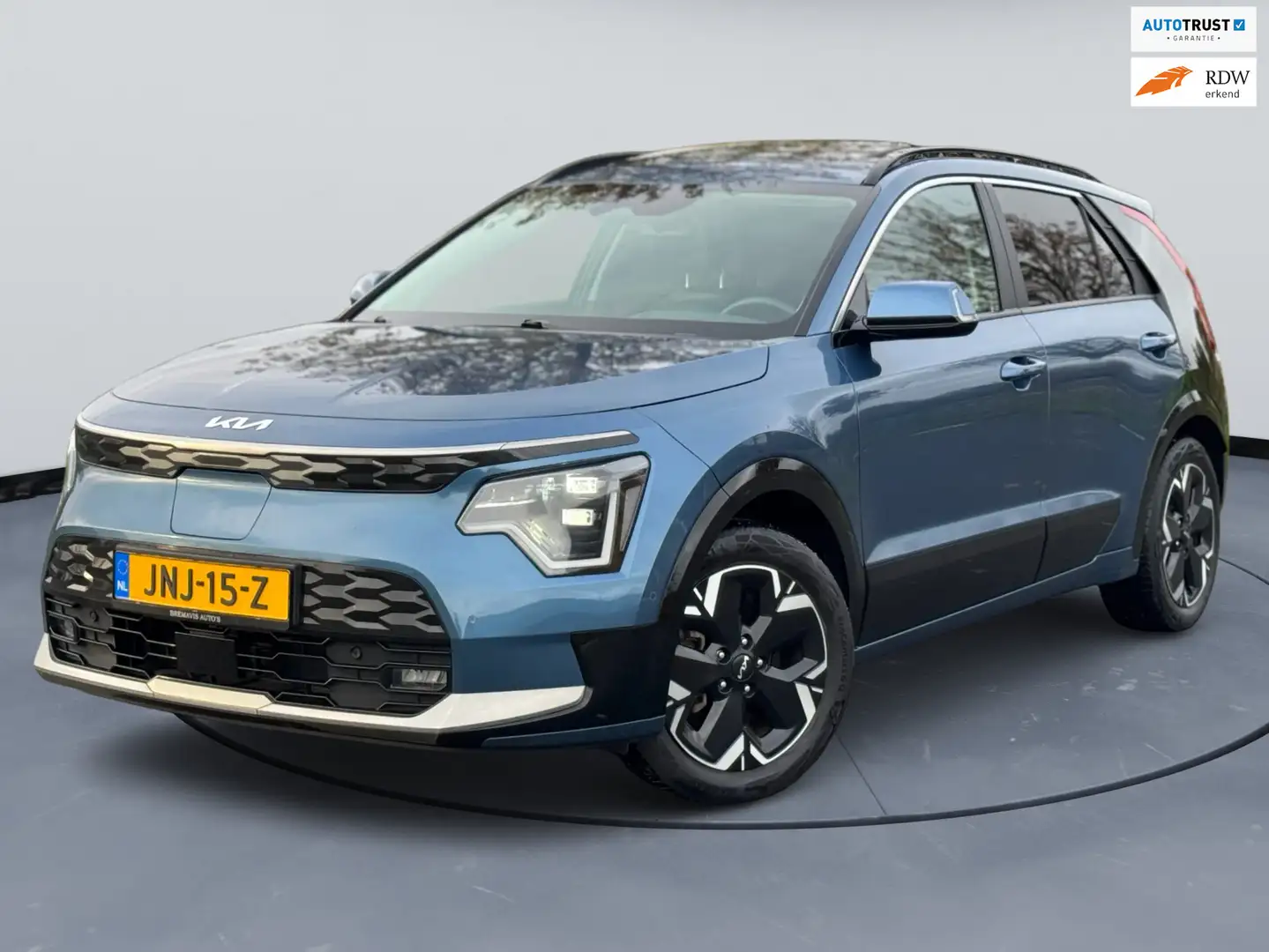 Kia e-Niro EV ExecutiveLine 64.8 kWh|3-FASE|SCHUIFD|LEER| Blauw - 1