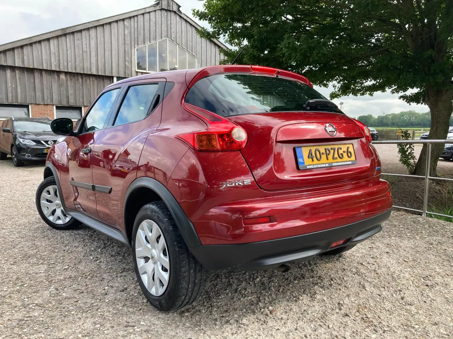 Nissan Juke 1.6 Visia Eco | NAP + Airco nu €6.975,-!! Rood - 2