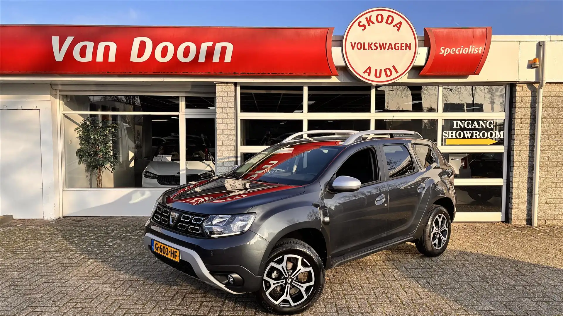 Dacia Duster 1.3 TCe 130pk GPF 4x2 Prestige Gris - 1