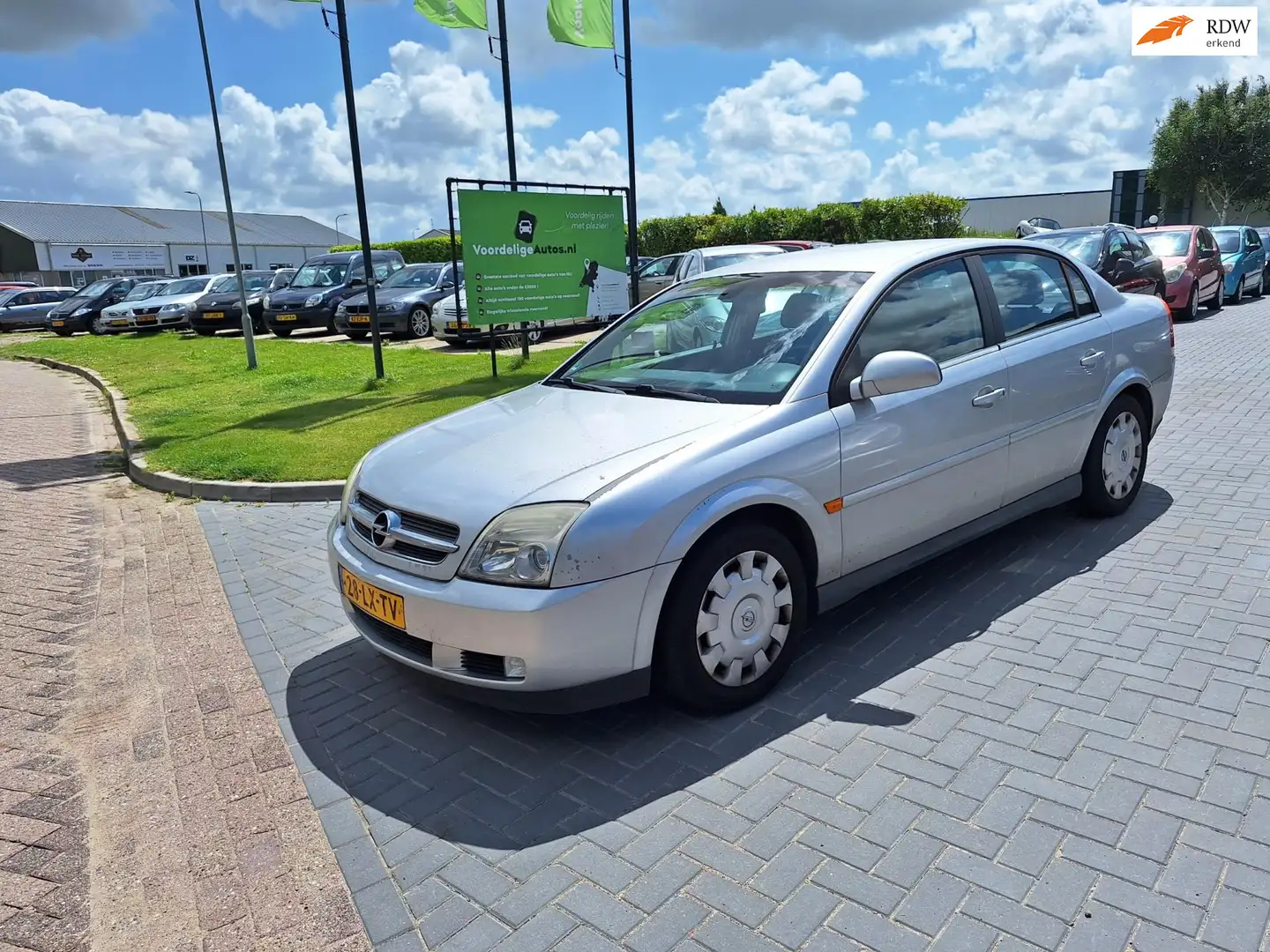 Opel Vectra 2.2-16V Elegance Navigator / APK januari 2026 Grigio - 1