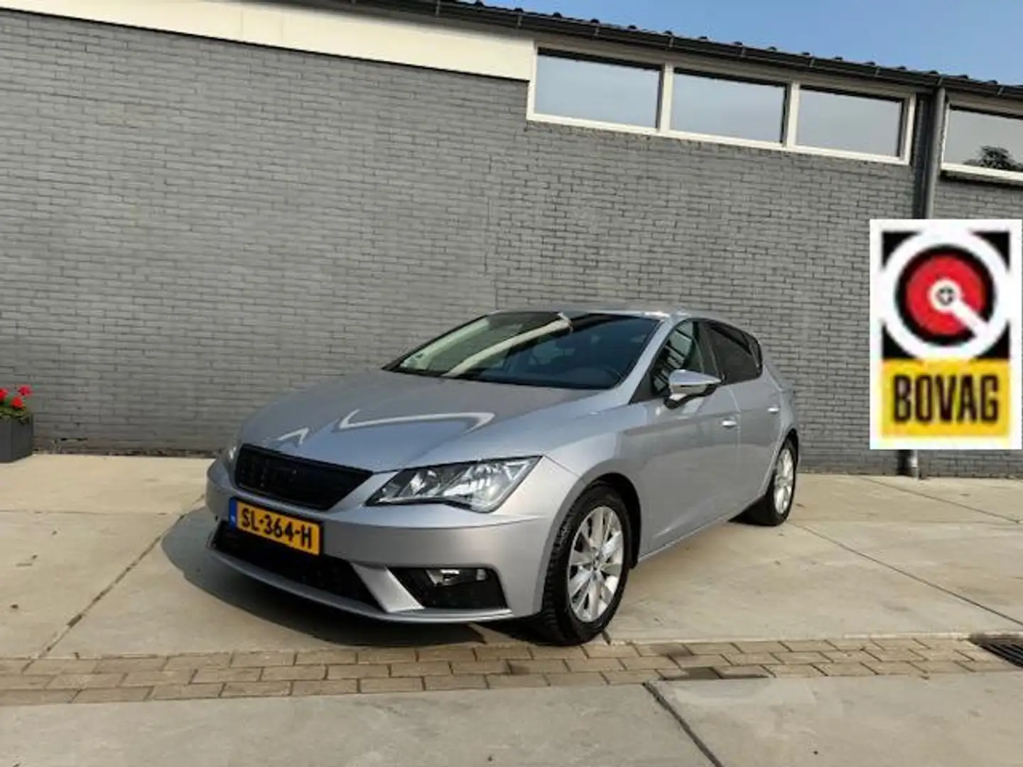 SEAT Leon 1.0 Style AUTOMAAT A/C | CRUISE | NAVI | BOVAG! Grijs - 1