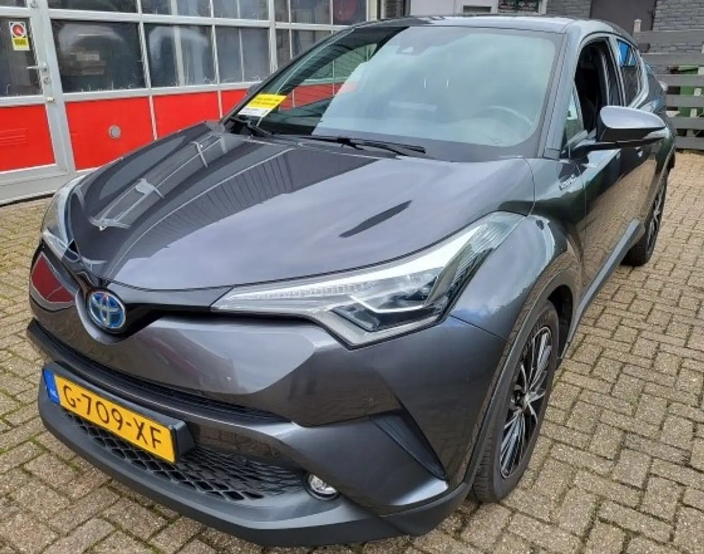 Toyota C-HR 1.8 Hyb. Exec. Ult. Navigatie,Blindspot,JBL,PDC Grijs - 2
