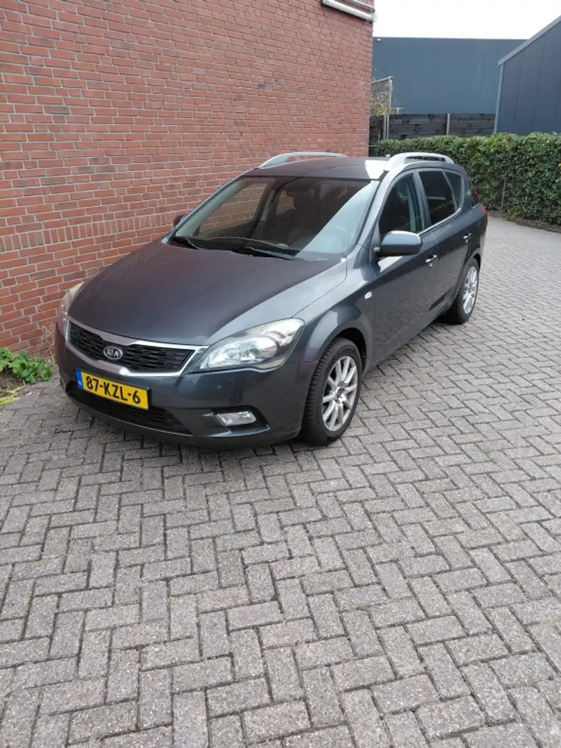 Kia Ceed / cee'd 1.4 CVVT X-ecutive Grijs - 1