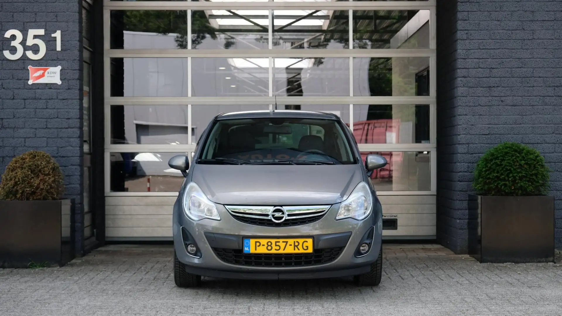 Opel Corsa 1.4-16V 5-drs Airco|Bluetooth|Cruise|Fietsendrager Bruin - 2