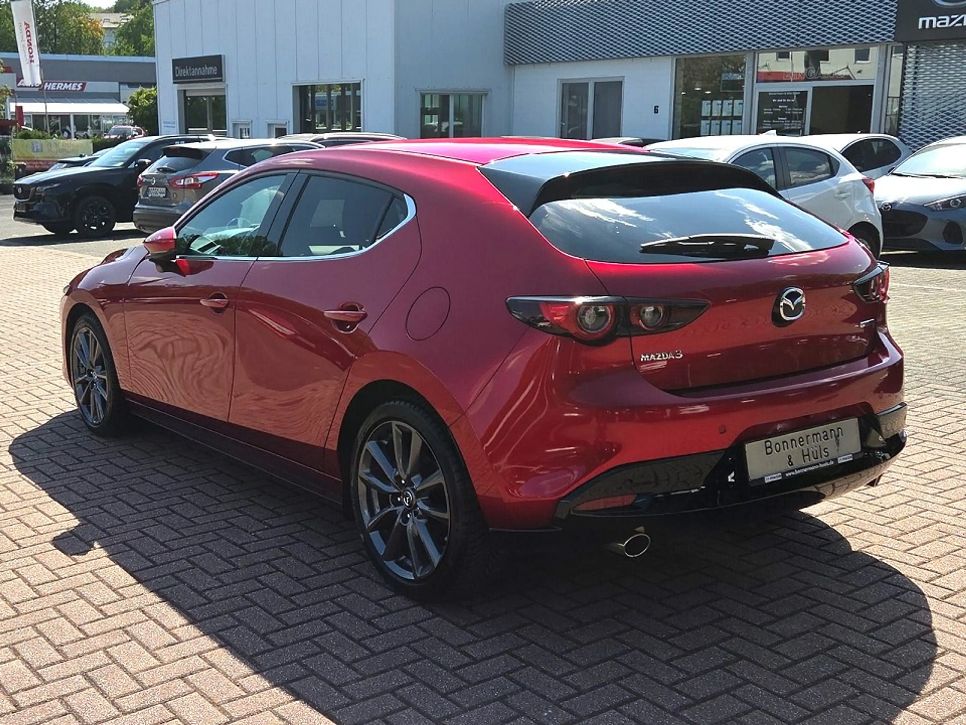 Mazda 3 2.5 M Hybrid Takumi *Leder*PDC*360°*Bose*Navi* — photo 2