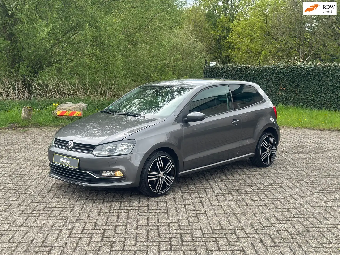 Volkswagen Polo 1.2 TSI Highline SPORT I ALCANTARA I PDC I CRUISE Grijs - 1