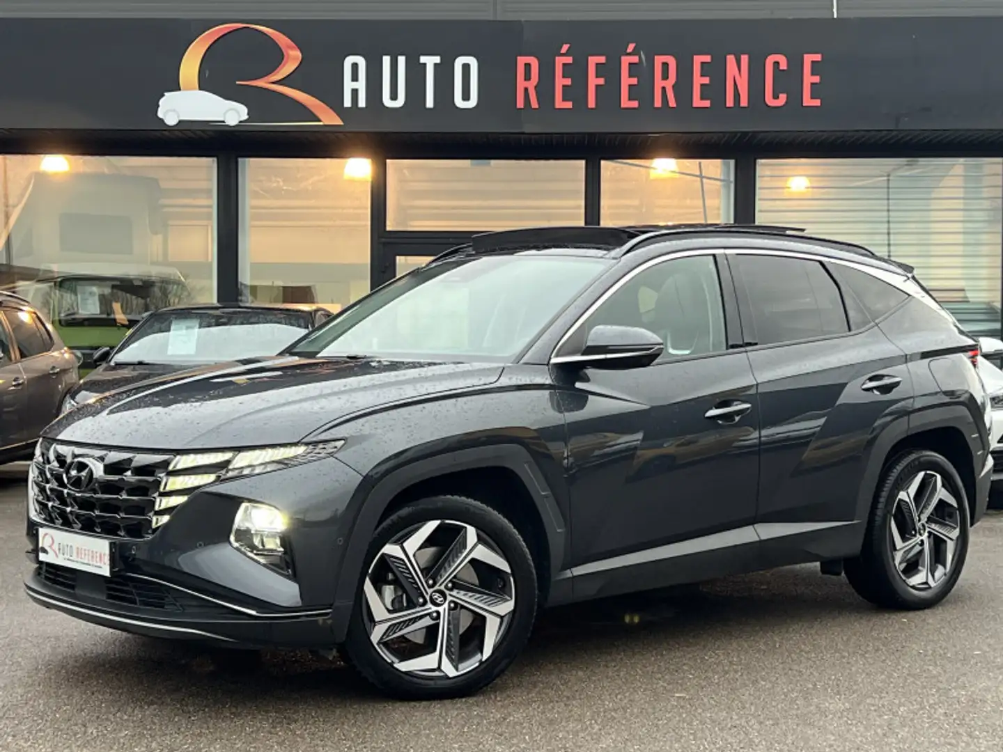 Hyundai TUCSON 1.6 T-GDI 230 CH HYBRID EXECUTIVE BVA6 / DERIV VP / 1ERE MAIN / CAMERA / SIEGES Grau - 1