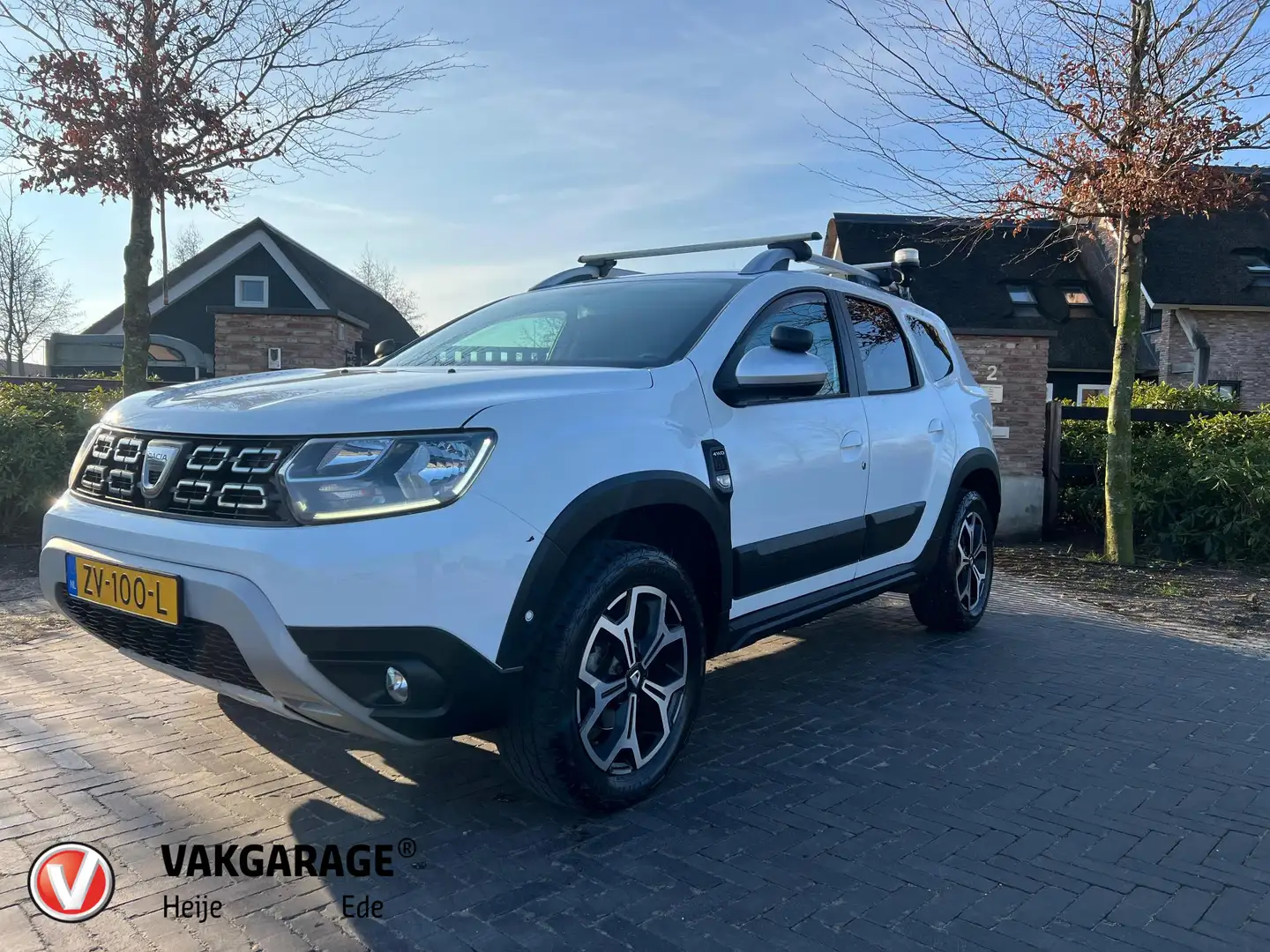 Dacia Duster 1.6 SCe Prestige | Unieke bedrijfswagen | 4X4 | Ca Wit - 1