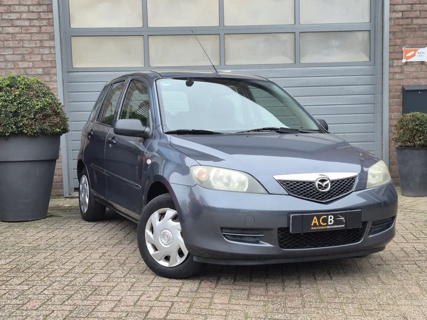 Mazda 2 1.4 Exclusive Trekhaak Grau - 1