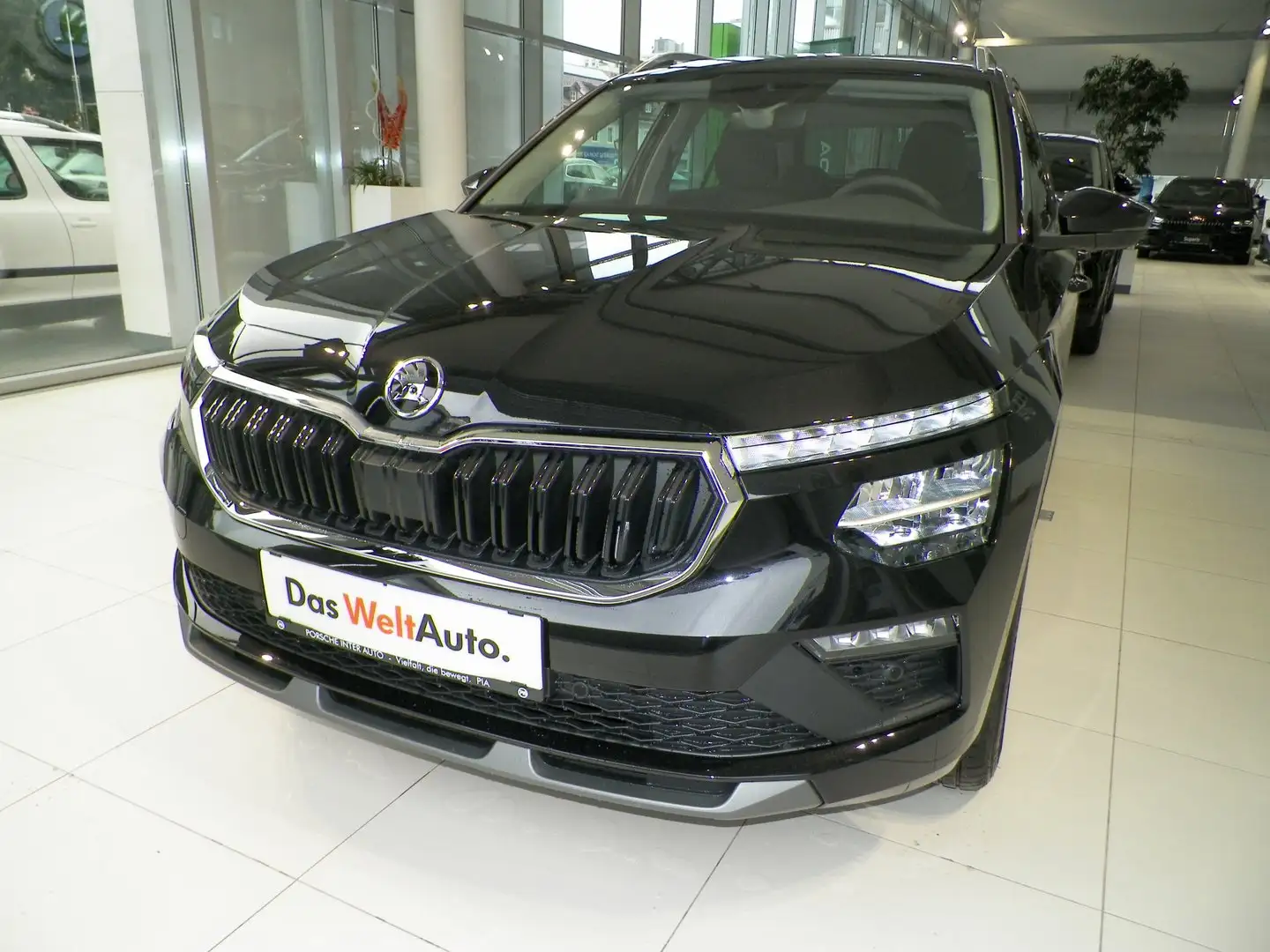 Skoda Kamiq Selection TSI DSG Schwarz - 1