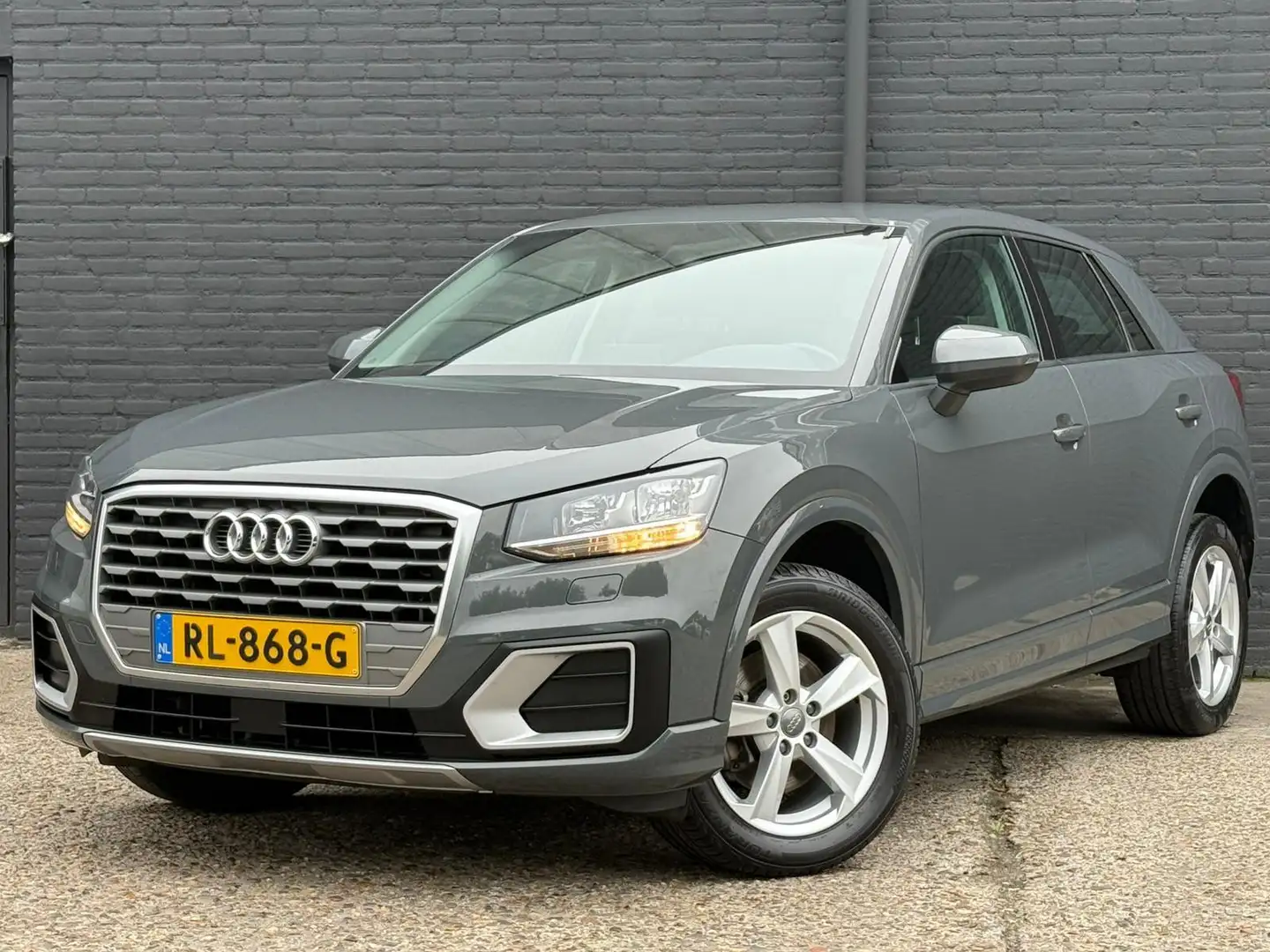 Audi Q2 1.0 TFSI Sport AIRCO | NAVI | AUTOMAAT | NWE APK Gris - 1