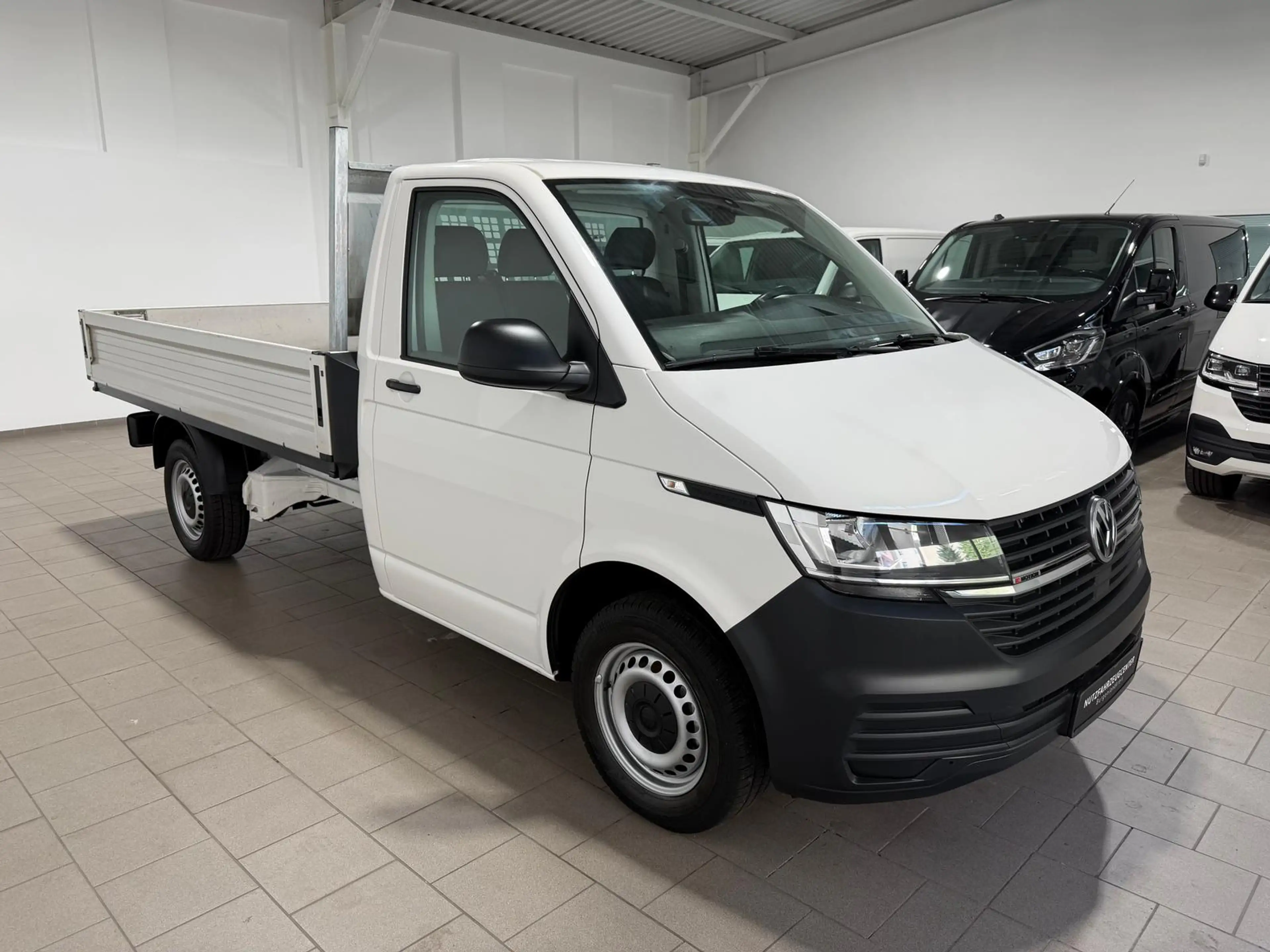 Volkswagen T6.1 Transporter T6.1 Pritsche-Einzelkabine,lang,Klima,Radio — photo 2