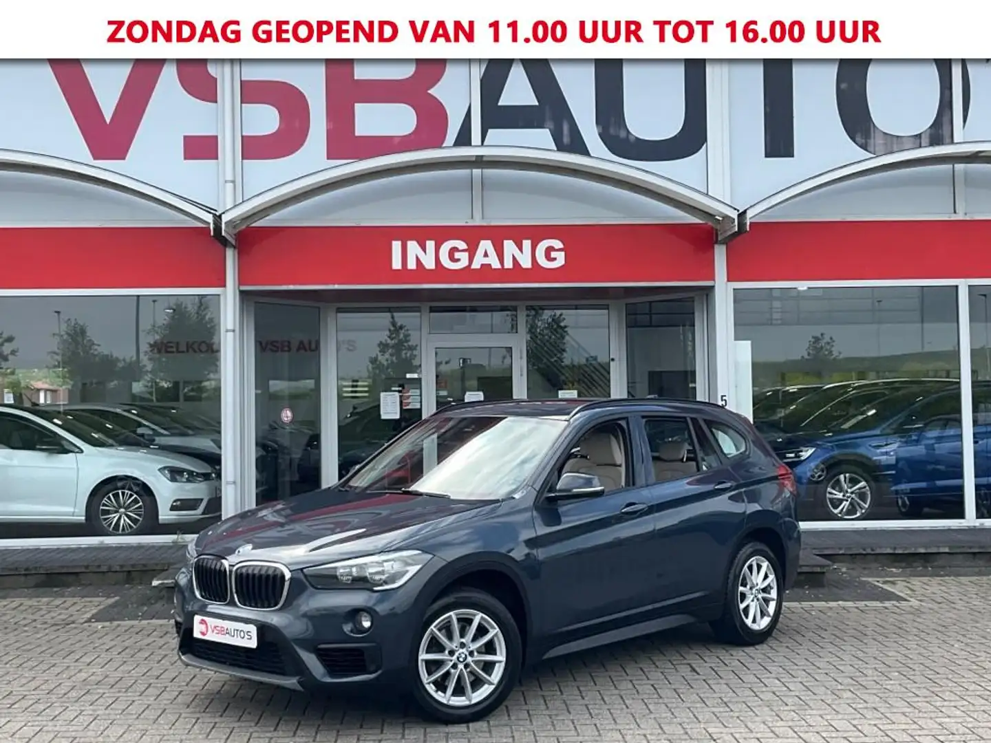 BMW X1 S-DRIVE 1.8 AUT. LEER NAVIGATIE AIRCO LMV PDC Grijs - 1