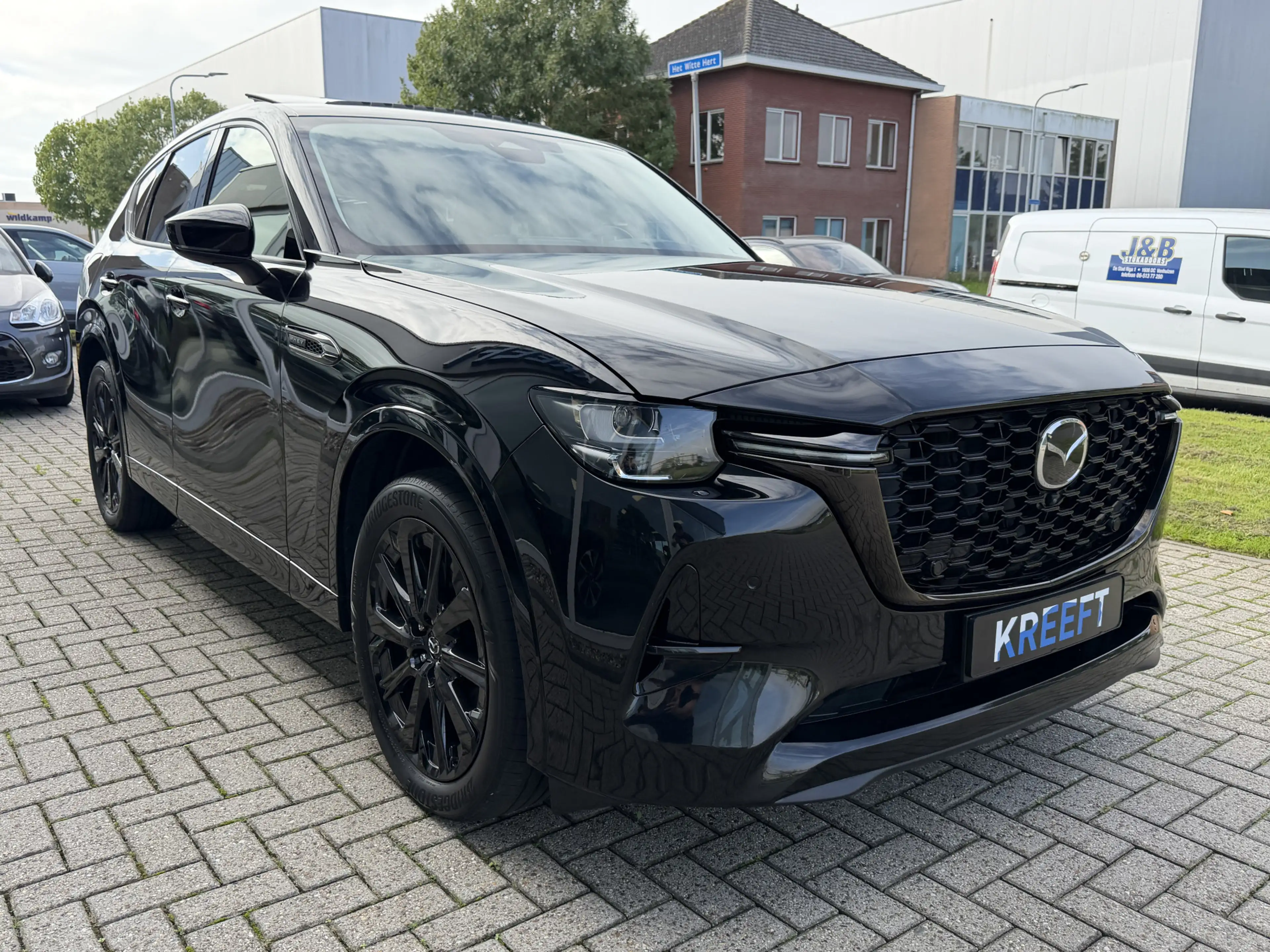 Mazda CX-60 2.5 e-SkyActiv PHEV Homura Black Edition — photo 6