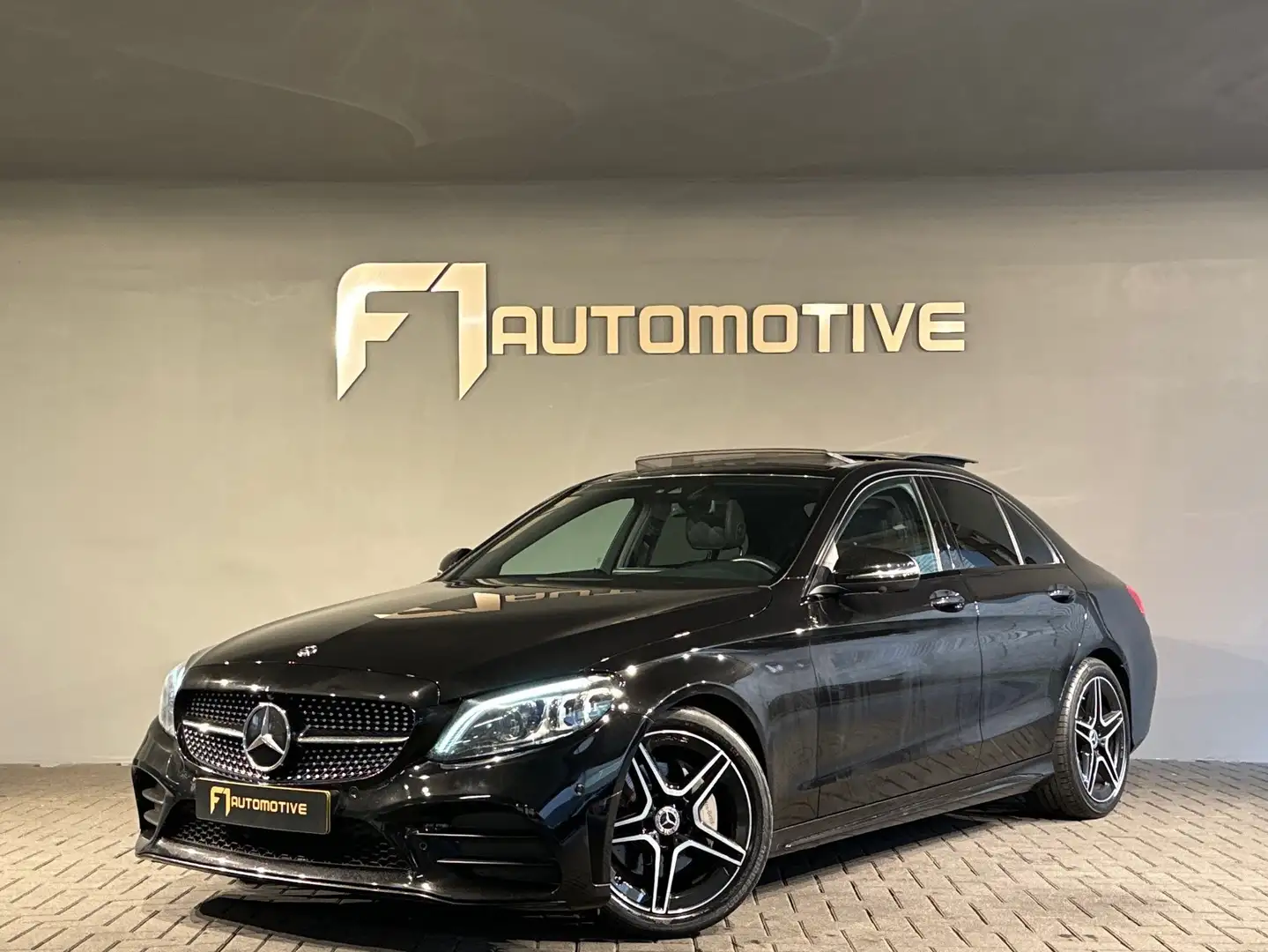 Mercedes-Benz C 180 Business AMG Pano|Sfeer|Leer|NAP Noir - 1