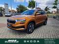 Skoda Karoq Tour 1.5 16V TSI ACT #7-Gang-DSG Orange - thumbnail 1