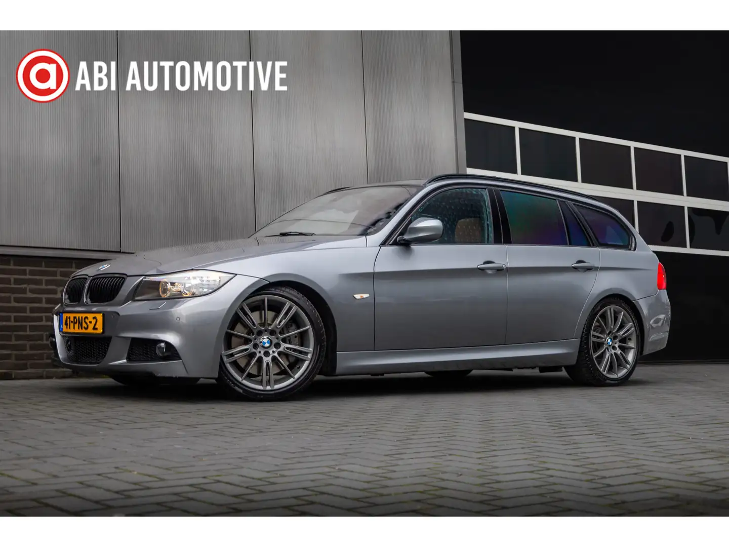 BMW 335 3-serie Touring 335i 306 pk M Sport Edition NL-Aut Grijs - 1