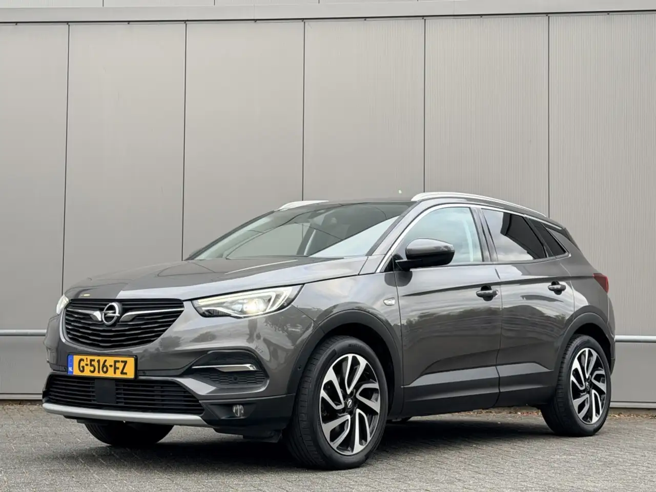 Opel Grandland X 1.2 Turbo Bus. Ex. automaat - navi - airco - trekh — photo 1 of 18