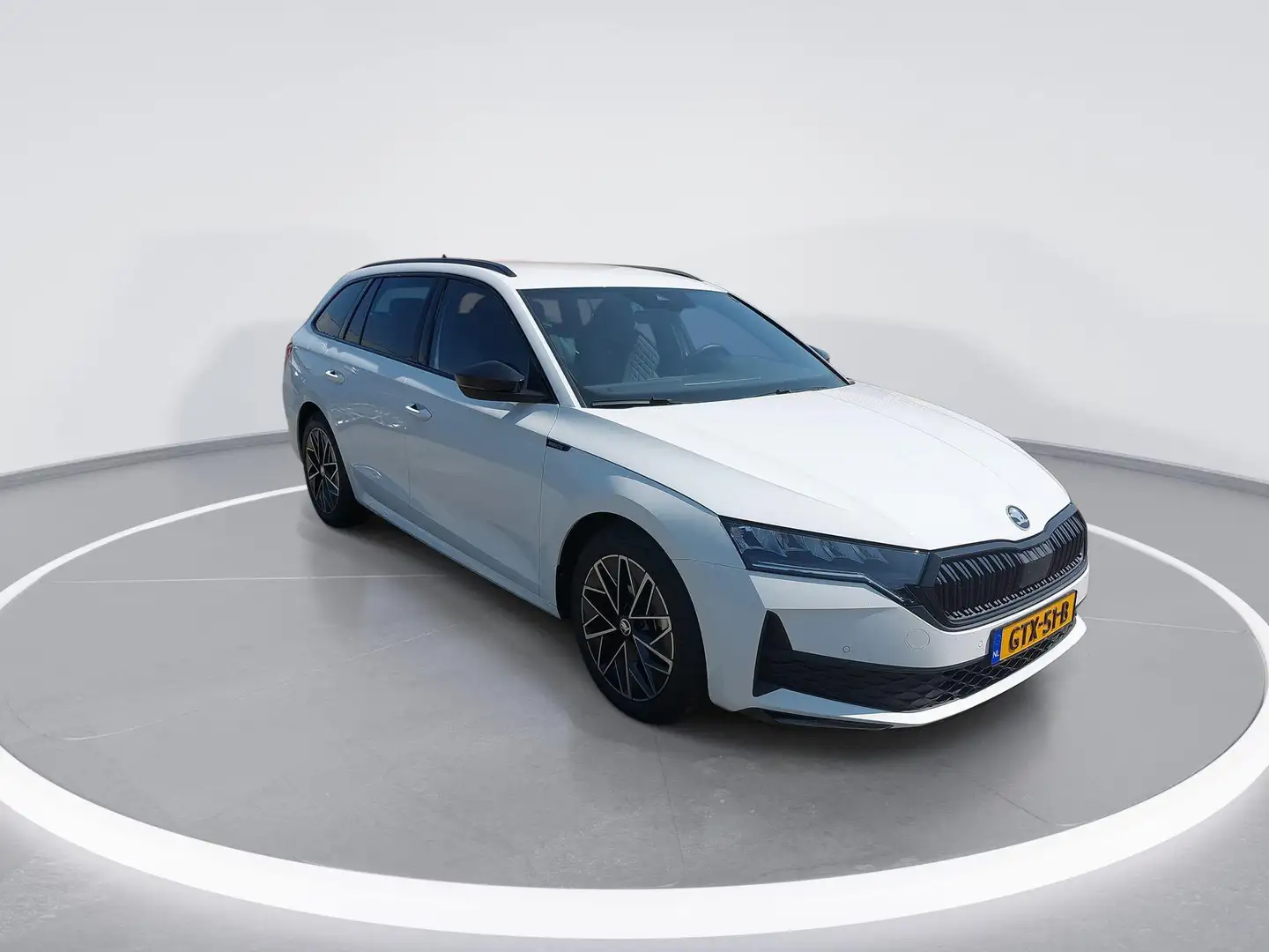Skoda Octavia Combi 1.5 TSI 150pk DSG MHEV Sportline Business · Wit - 2
