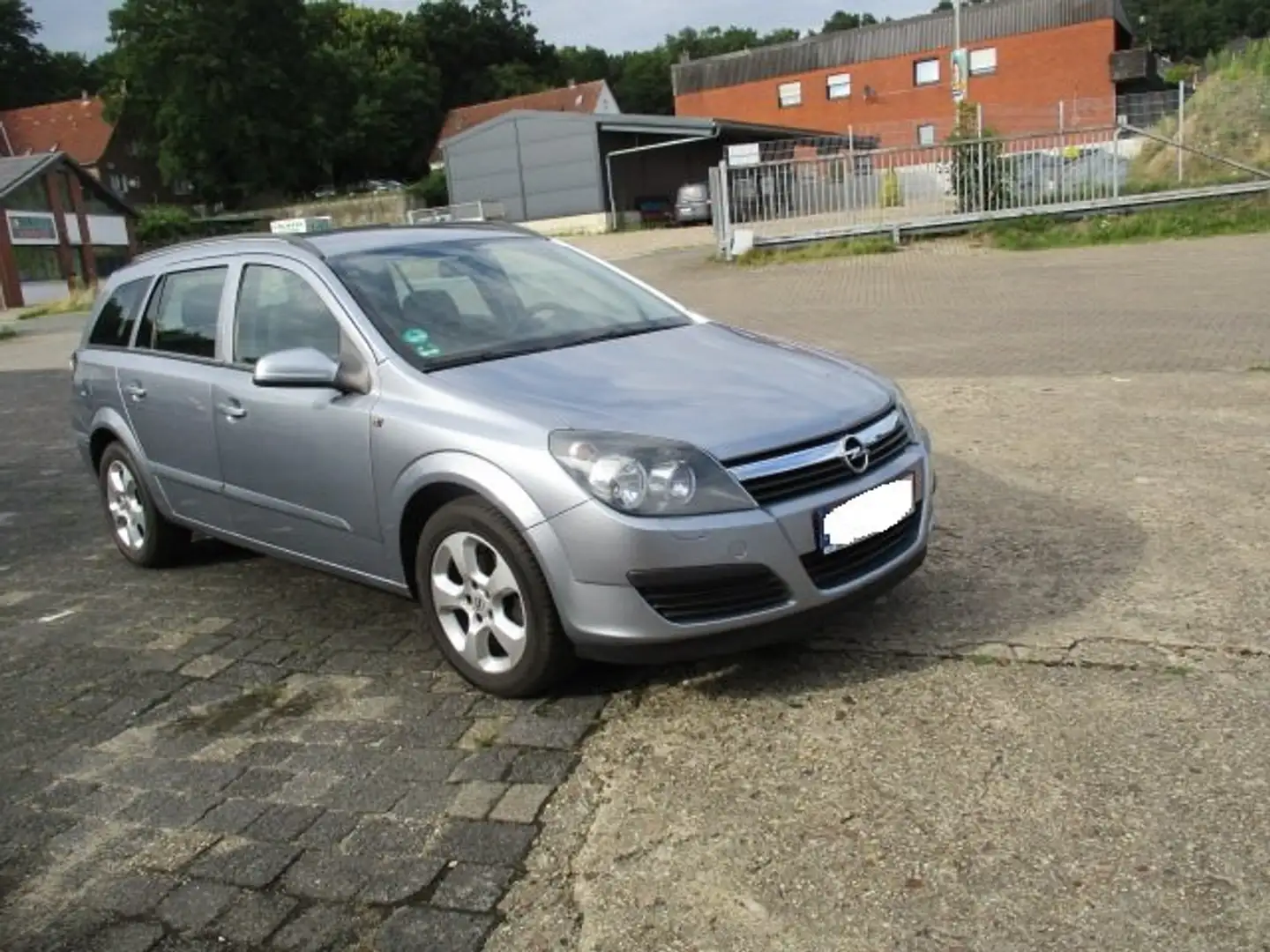 Opel Astra 1.6 Caravan Easytronic Edition Grijs - 1